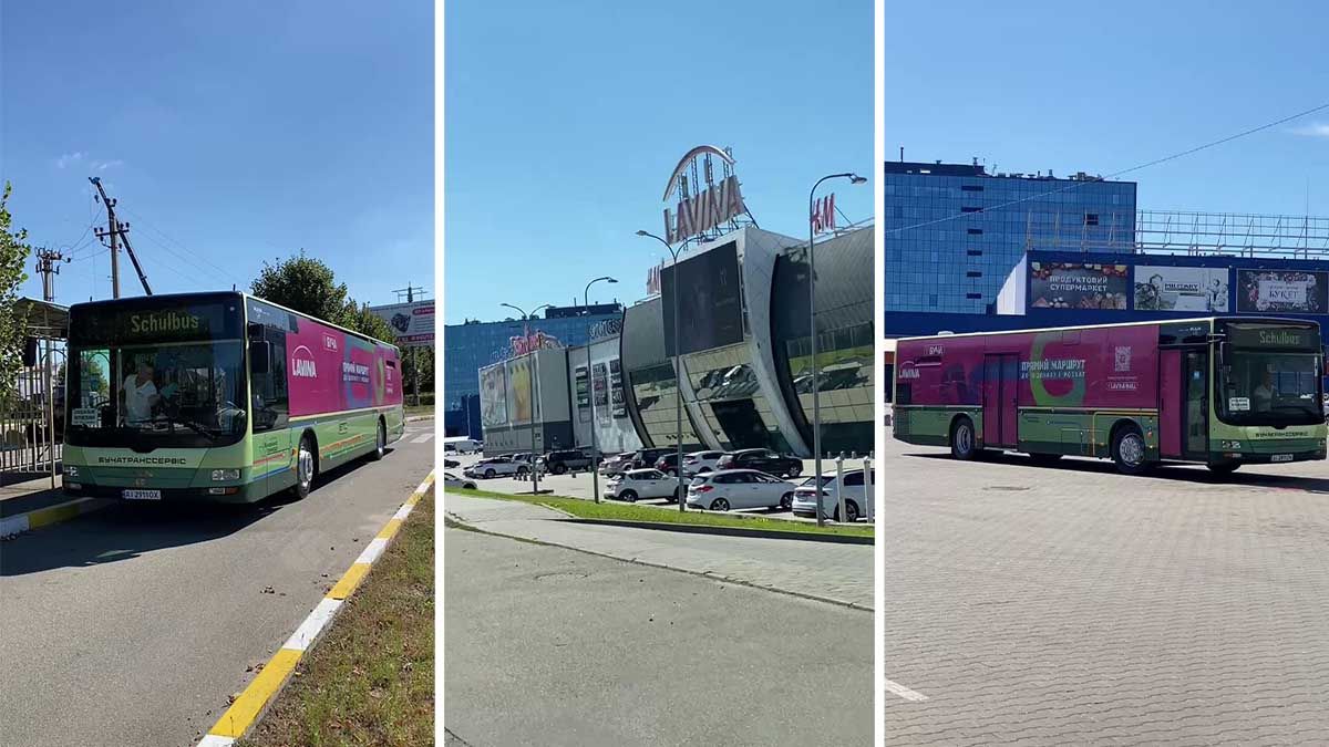 Прямий автобус із Бучі до ТРЦ Lavina Mall (розклад руху) Зелений міський автобус біля зупинки на вулиці Києва, сучасна архітектура торгового центру з логотипом "Київ" на фасаді, автомобілі та житлові будівлі у фоновому плані, ясна погода.