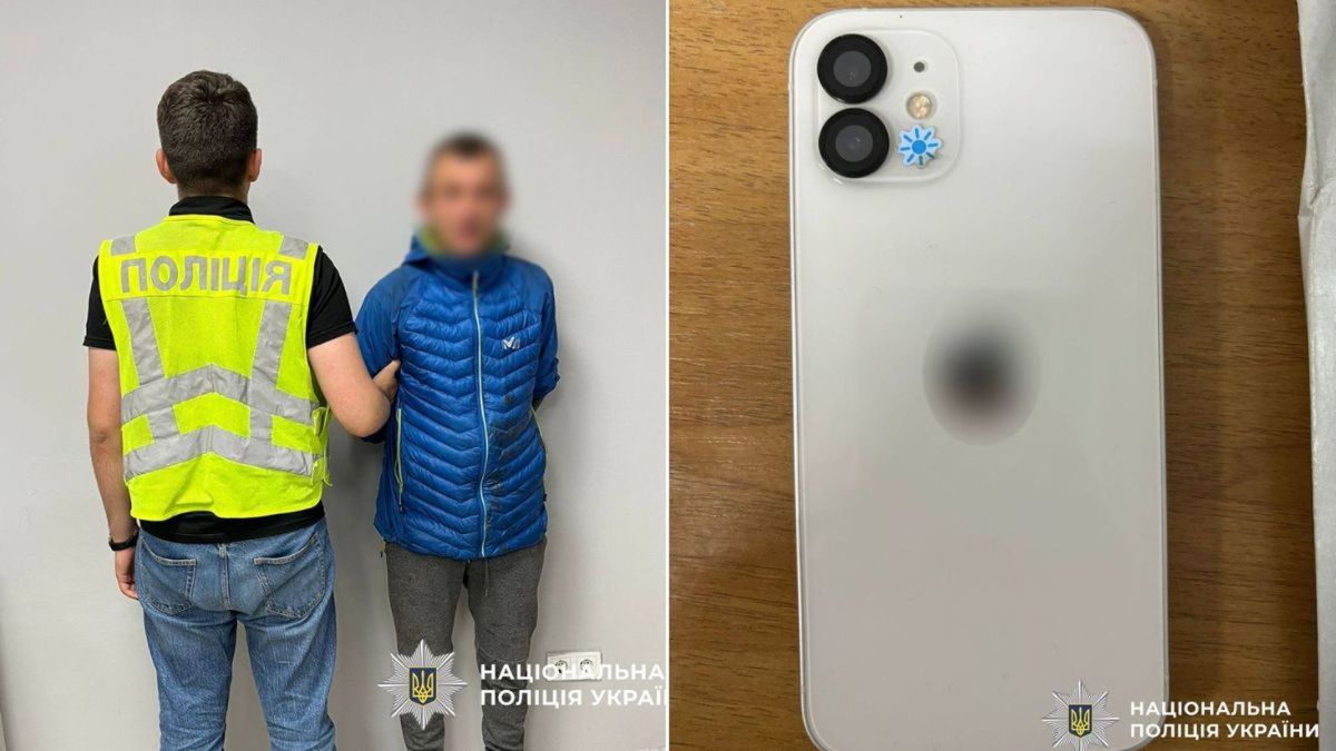 У Києві грабіжник отримав 7 років за напад і крадіжку смартфона в Голосієві Поліцейський у жовтому жилеті затримує чоловіка в синій куртці, поруч фото білого смартфона