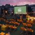 Головні новини Києва | Kyiv.News Лежаки й екран кінотеатру просто неба JUST IN CINEMA на даху будинку на Подолі в Києві на тлі вечірнього неба
