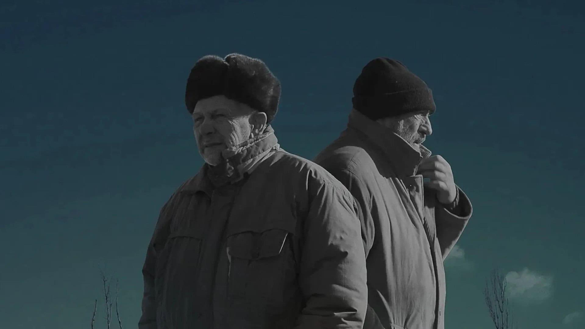 Вперше радіодиктант буде і жестовою мовою також: заявка на рекорд Двоє чоловіків у теплому одязі стоять спинами один до одного