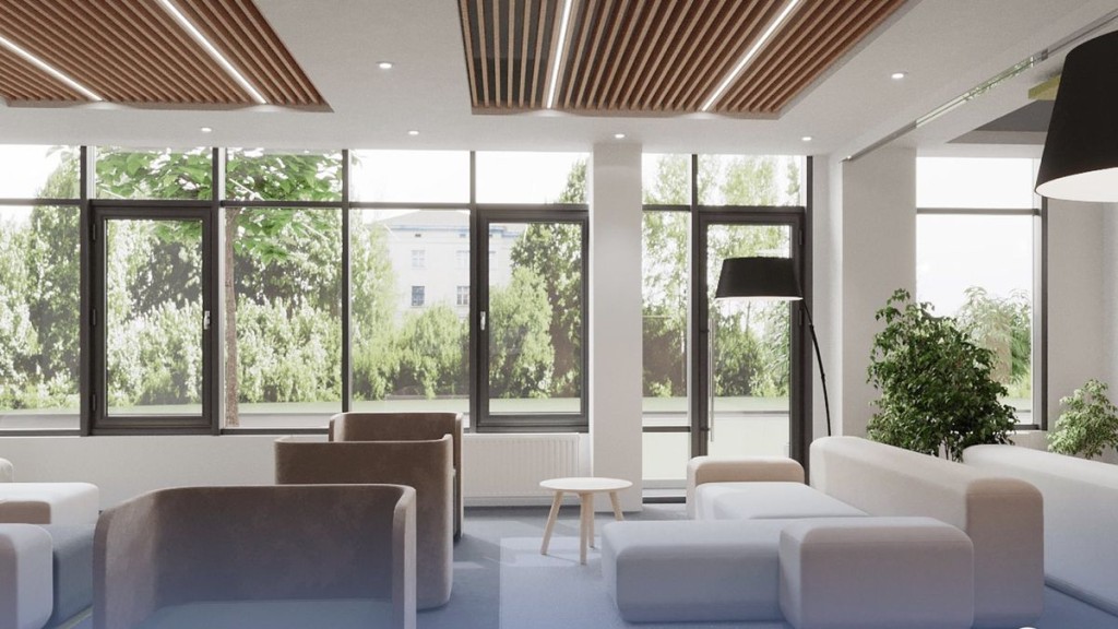 Сучасна вітальня з великими вікнами, білими стінами, зеленими рослинами та м’якими меблями