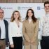 Учасники презентації бази олімпіадних задач з математики Apex Minds позують на тлі пресволу Apex Talent Foundation у Києві