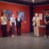 Організатори та гості на відкритті ювілейної виставки Івана Марчука «Я сколихнув цей світ» у Музеї історії міста Києва на тлі полотен художника