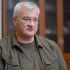 Головні новини Києва | Kyiv.News Портрет міністра закордонних справ України Андрія Сибіги в окулярах, кабінет із дерев’яними шафами